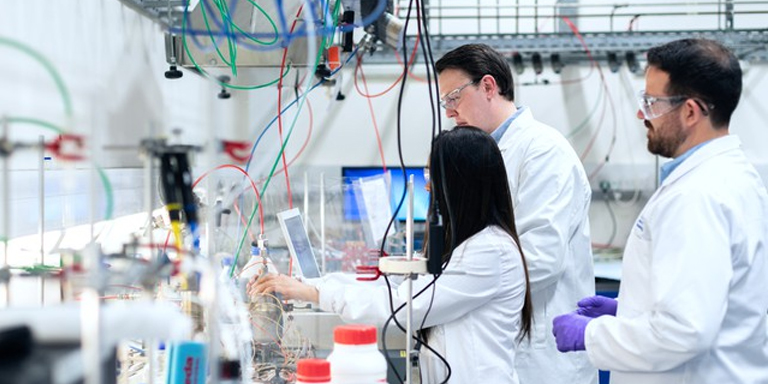 a group of students in a lab appears to be engage in chemical engineering homework and assignment help 