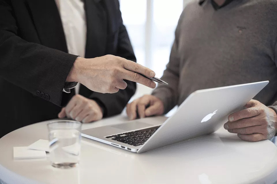 Two students participating in an online management consulting homework help, with Online Consulting Tutors