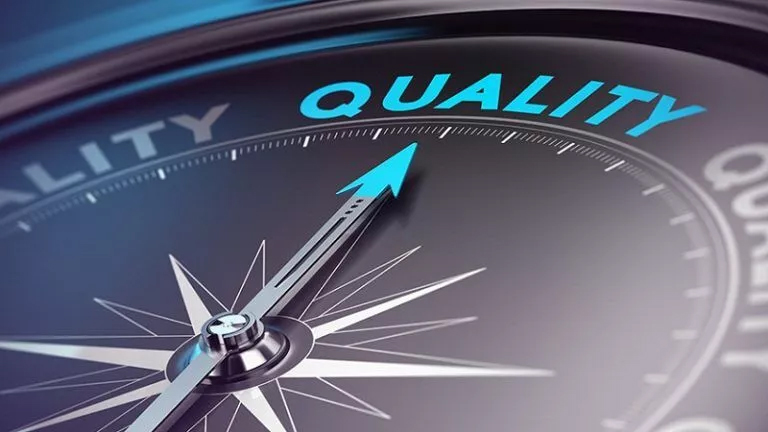 Quality Management Homework Help concept: A compass pointing to quality, guiding organizations towards excellence