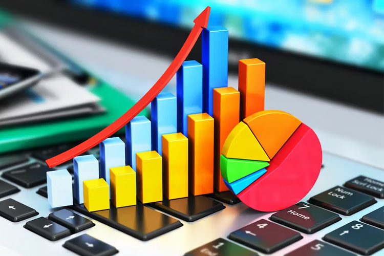 Laptop displaying business growth chart, representing statistics tutoring session